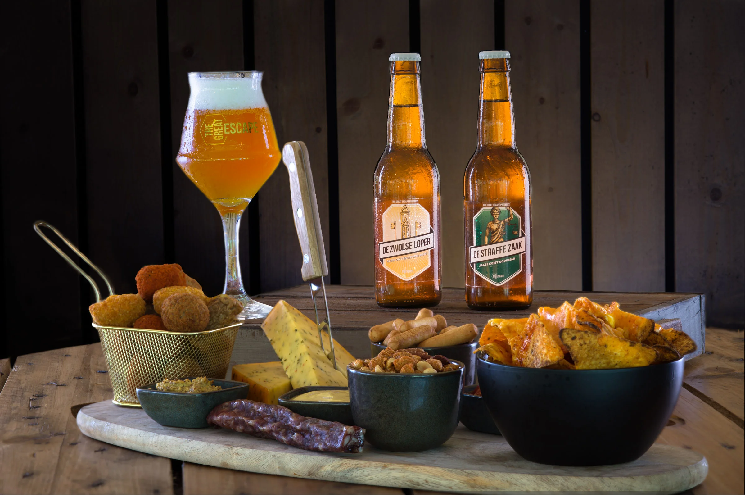 Zwolle beer, snacks, and escapes. Cozy atmosphere on a wooden table.